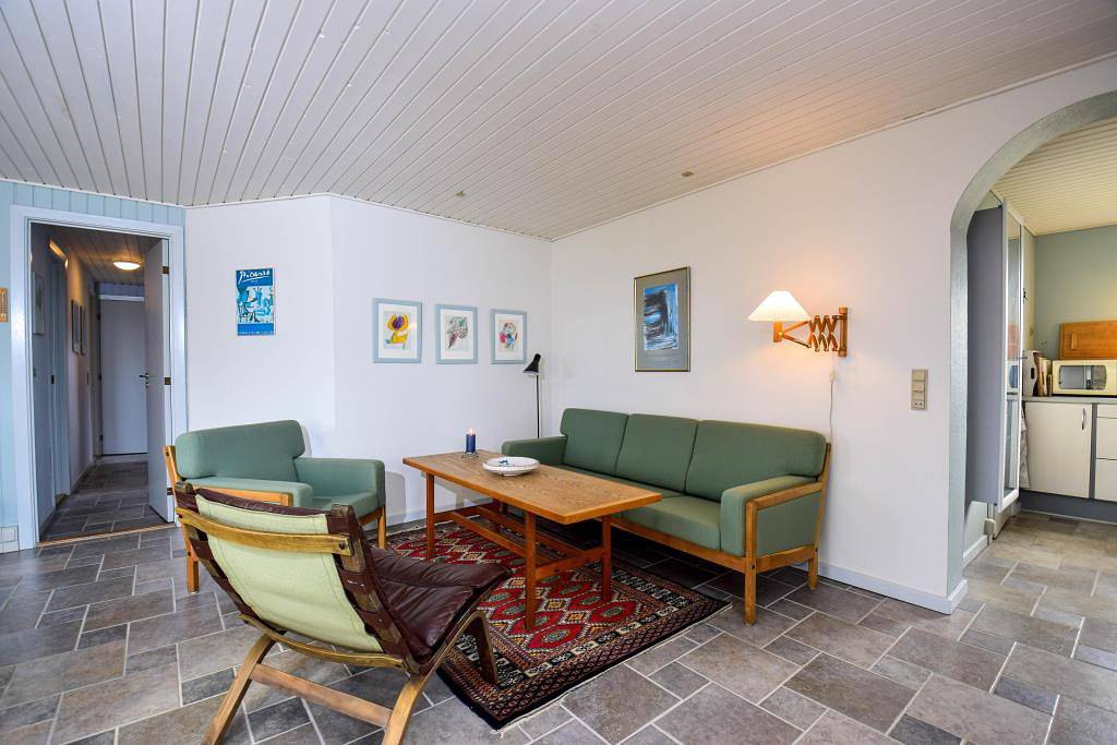 Älteres Ferienhaus mit überdachter Südterrasse, Sauna und Kaminofen in Ulfborg, Nissum Fjord