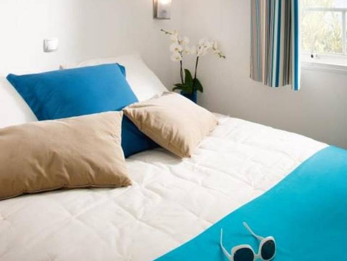 Flower Camping Les Ilates - Mobilhome 4 personnes - Mobil-Home Confort 27,5m² (2 chambres) + Tv + terrasse semi-couverte | 4 personnes in Loix, Île de Ré