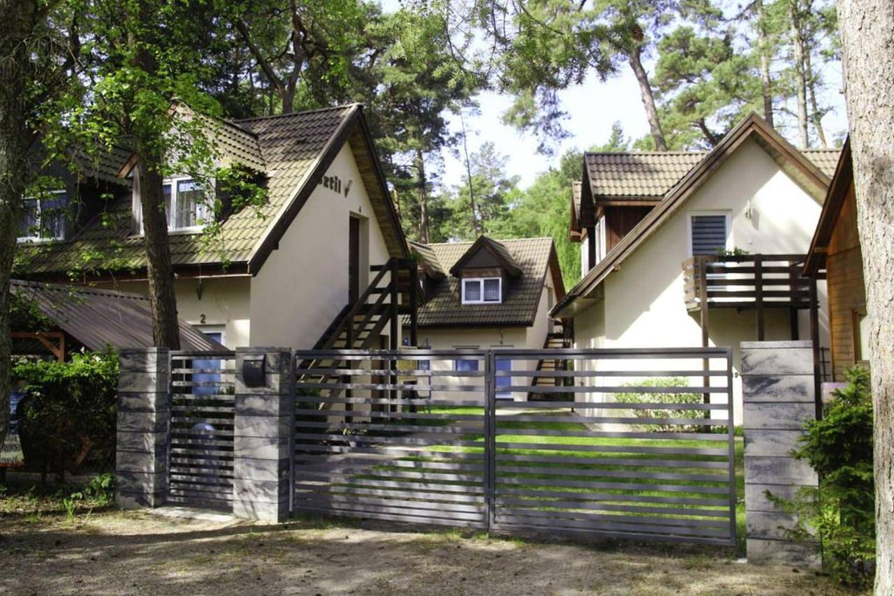 Sztil - Apartamenty i drewniane domki in Pobierowo, Powiat gryficki