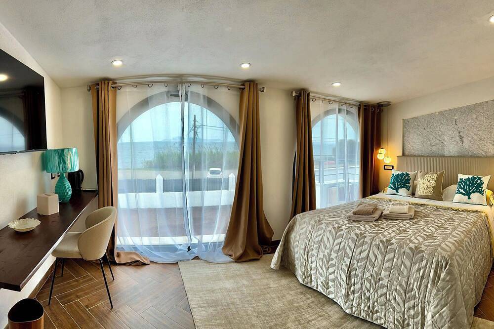 Oripascal Suite & Relax - Room Libeccio Superior\naccogliente Elegante Funzionale in Foxi, Campidano