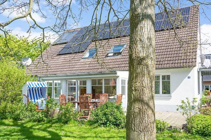 Ferienwohnung für 4 Personen, mit Terrasse und Garten sowie Sauna in Langholz