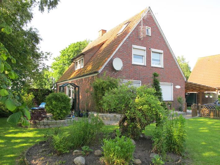 Ferienwohnung für 6 Personen, mit Terrasse und Garten sowie Seeblick in Wangerland
