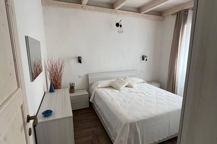 Apartamento entero, Casa Vacanze Iris - Tres Habitaciones Piso, Capacidad 6 in Carbonia, Sulcis Iglesiente