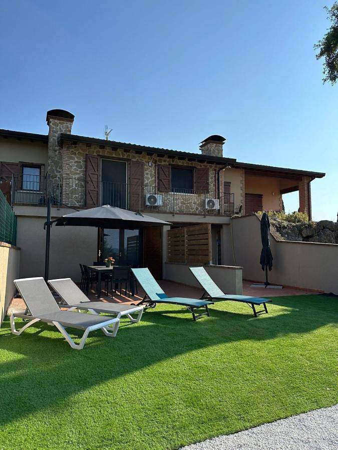 Ferienwohnung für 4 Personen, mit Balkon und Terrasse sowie Garten und Ausblick