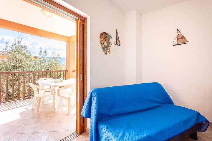 Appartamento intero, Appartamento 'La Basoledda' con vista mare, terrazza privata e aria condizionata in Isola Rossa, Trinità d'Agultu e Vignola