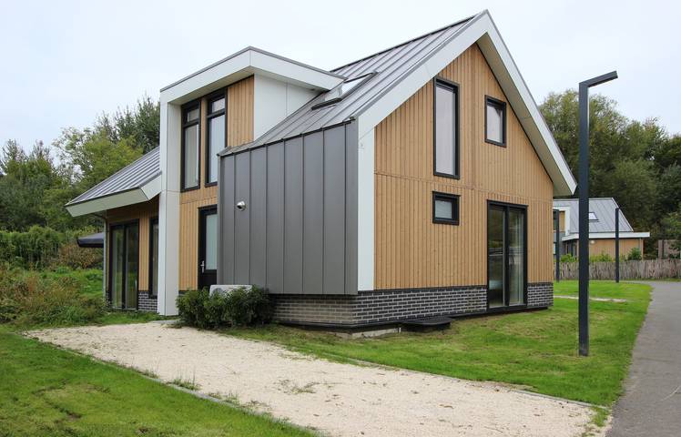 Ferienhaus für 12 Personen, mit Balkon/Terrasse und Terrasse sowie Garten und Sauna