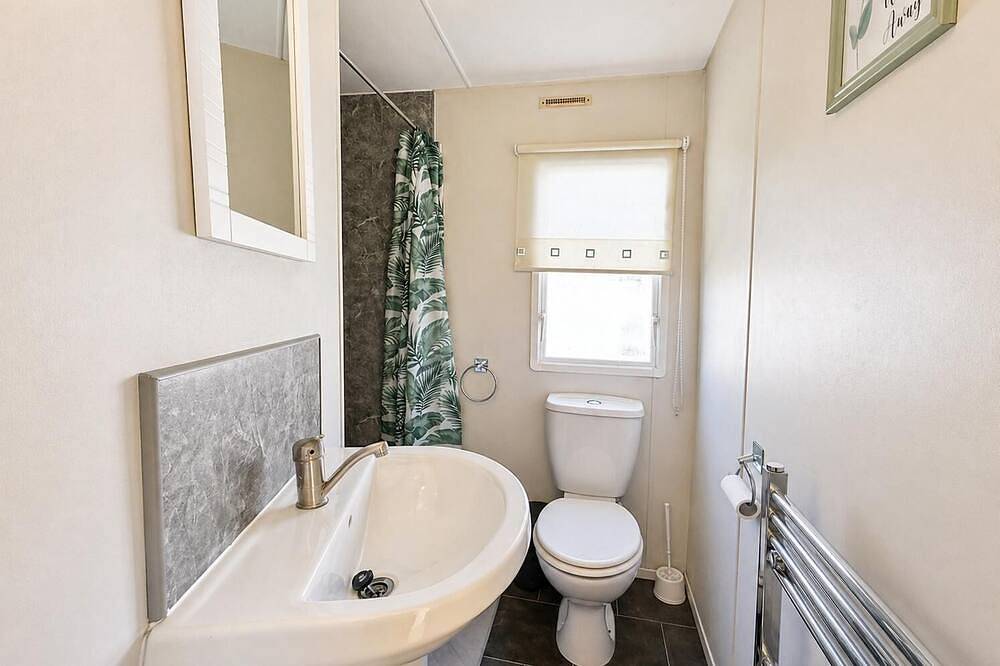 Homely 8 berth caravan at Highfield Grange in Essex in Clacton-on-Sea, Essex