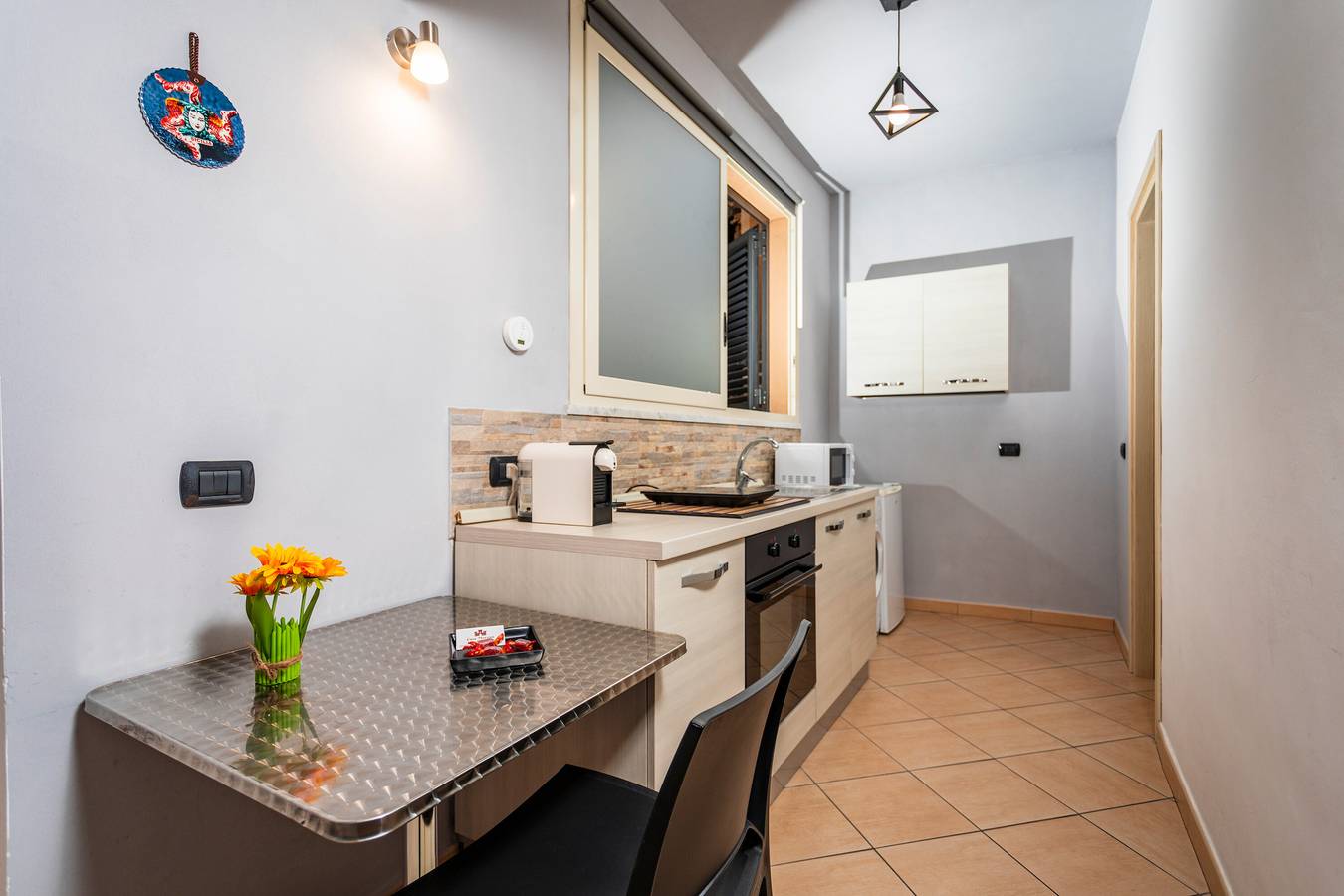 Camera 'Matrimoniale Con Cucina' con Wi-Fi e Aria Condizionata in Catania, Catania e dintorni