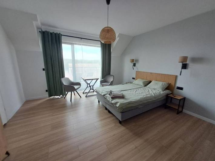 Ośrodek wypoczynkowy dla 8 osób, z widok na jezioro i ogród oraz widok na Mazury