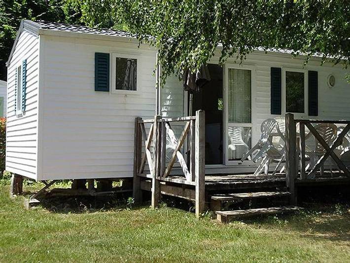 Flower Camping L'Echo du Malpas - Mobilhome 4/6 personnes - Standard 27m² - 2 chambres - TV - Terrasse non couverte in Monceaux-sur-Dordogne, Région de Tulle