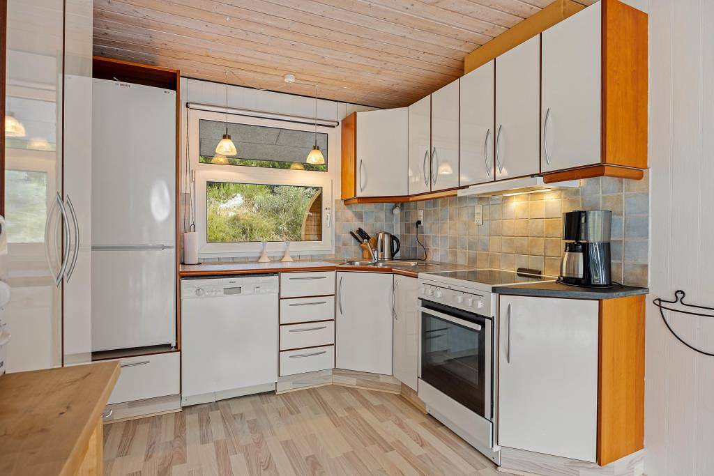 Ferienhaus mit Spa, Außensauna und Außendusche in Henne Strand in Henne, Filsø See