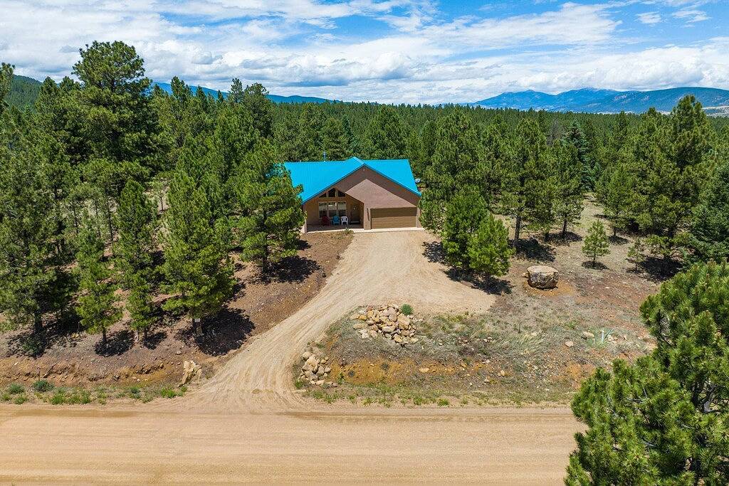 Custom Home with Two Private Master Suites and Heated Garage in Angel Fire, Colfax County