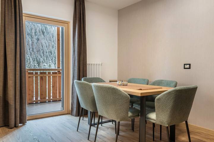 Appartamento per 4 persone, con giardino, adatto a famiglie con bambini a Campitello di Fassa