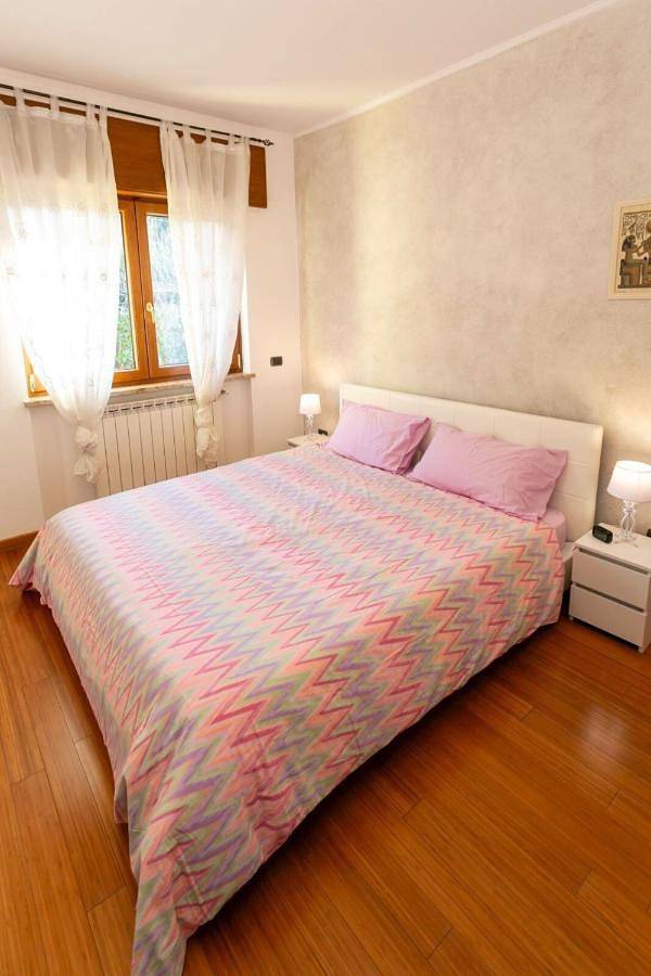 Ferienwohnung für 6 Personen, mit Garten und Ausblick in Porto Ceresio