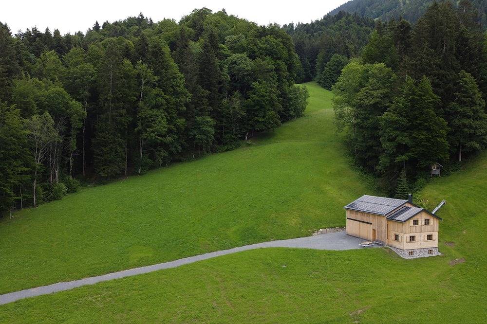 Modern vacation hut in a quiet, secluded location at the foot of the Hirschberg, with terrace in Bizau, Bregenz Forest