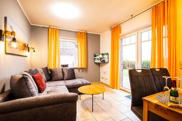 Ferienwohnung für 4 Personen, mit Garten und Ausblick, kinderfreundlich in Werdum