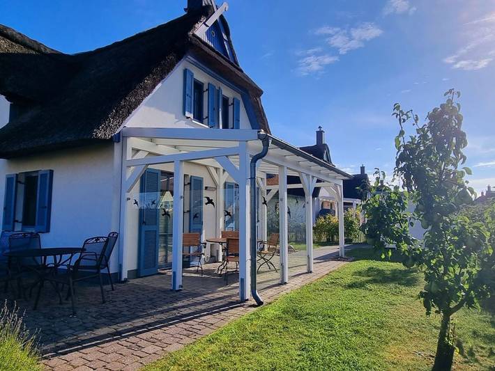 Ferienhaus für 4 Personen, mit Garten und Seeblick sowie Sauna, kinderfreundlich in Zierow