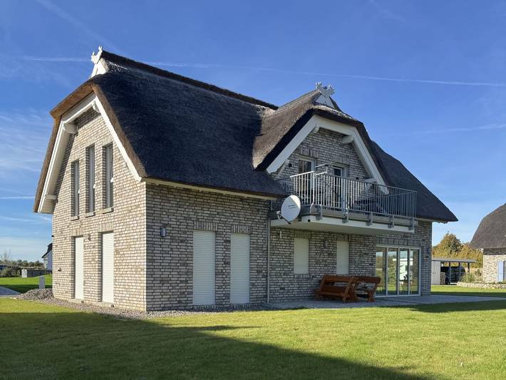 Ferienwohnung für 2 Personen, mit Balkon und Seeblick in Poseritz