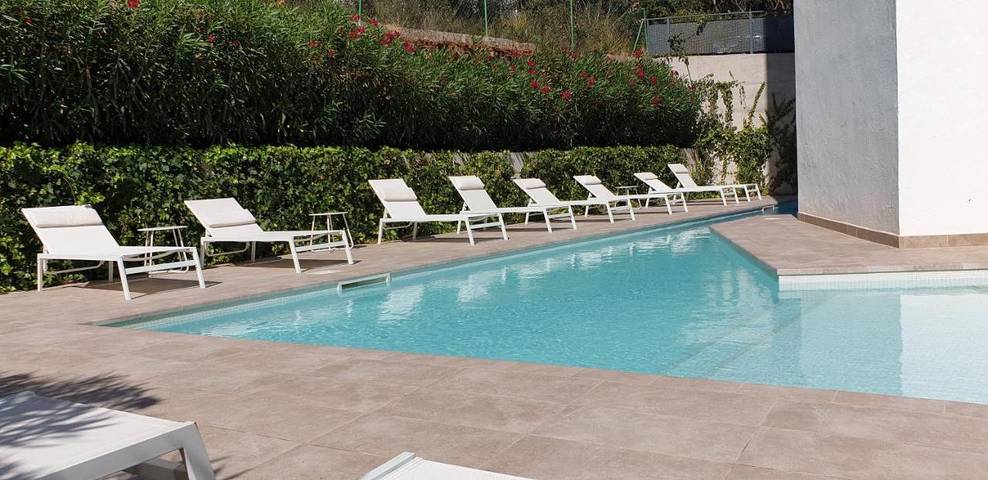 Ferienwohnung für 2 Personen, mit Terrasse und Garten sowie Pool und Ausblick in Canyamel