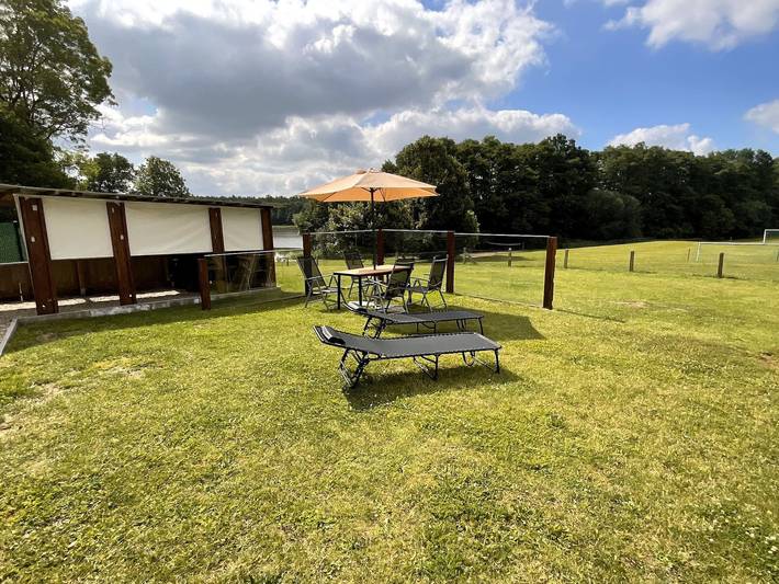 Komfortables Ferienhaus mit direktem Seeblick - Seeblick in Reimershagen, Mecklenburgische Seenplatte