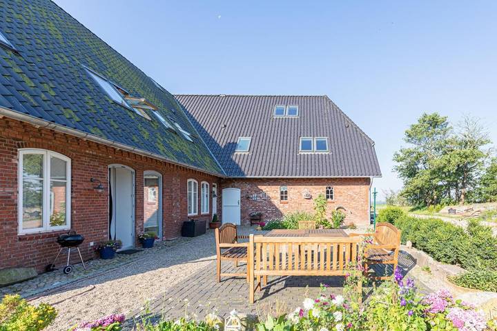 Ferienwohnung für 3 Personen, mit Terrasse und Garten sowie Ausblick in Schobüll