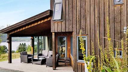 Ferienhaus für 7 Personen, mit Terrasse und Garten sowie Ausblick in Suldal