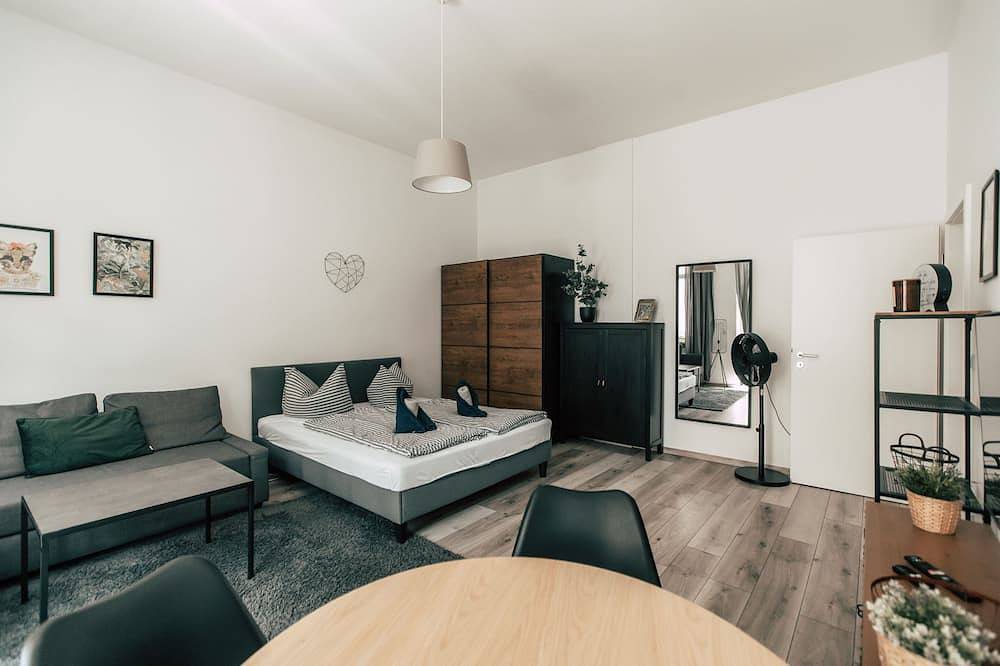 Apartamento entero, Luga Homes - Gewandhaus - Industrial Studio mit Küche und Balkon in Leipzig Mitte, Leipzig