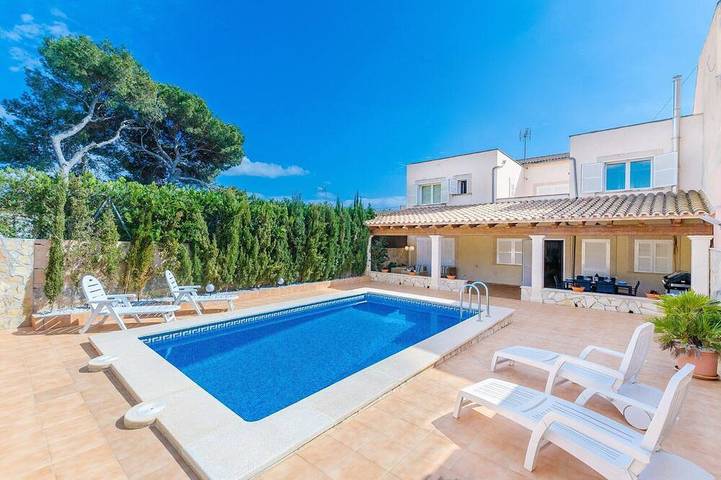 Villa pour 8 personnes, avec jardin à Cala Pi