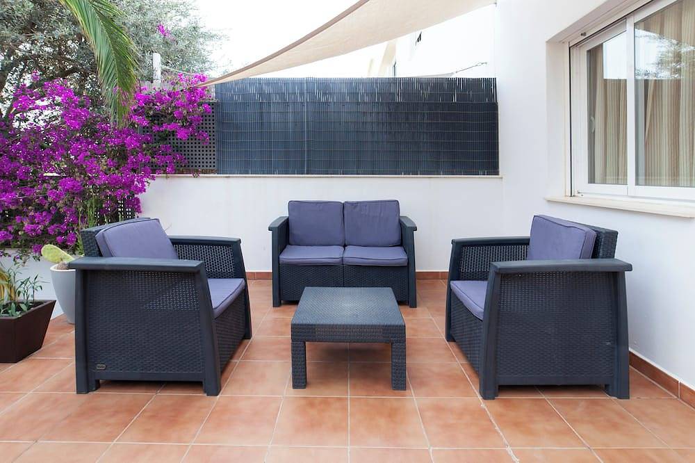 Apartamento entero, Can Sord- Apartamento con amplia Terraza/Jardín.  Con A/C y wifi in La Savina, Formentera