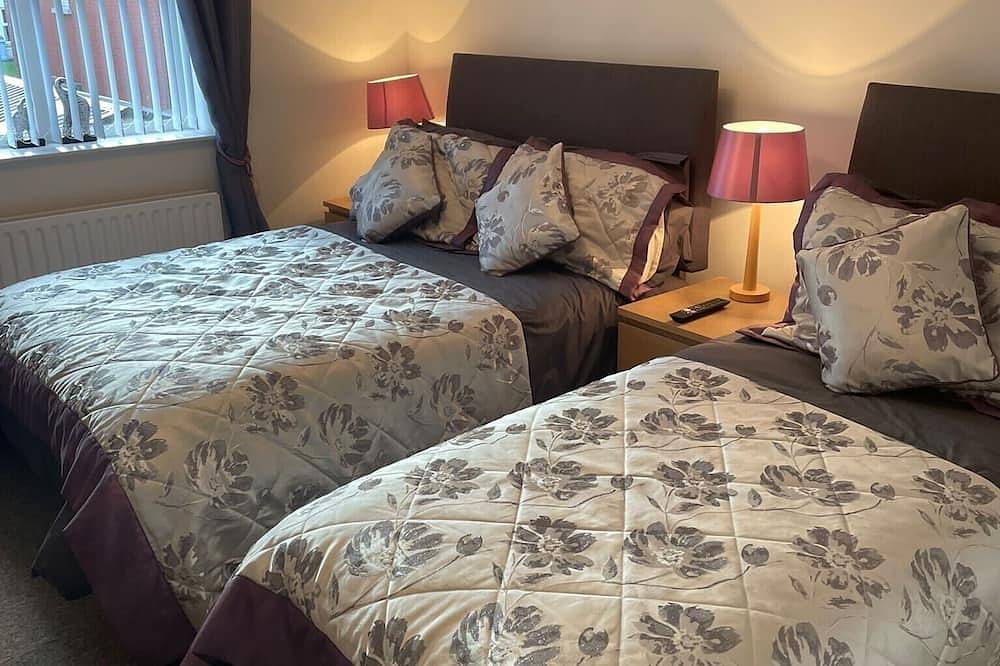 Luxus Portrush Ferienhäuser - The Green. Schlafmöglichkeiten für 11 in 8 Betten. Hunde. Wifi Golf in Portrush, Grafschaft Londonderry