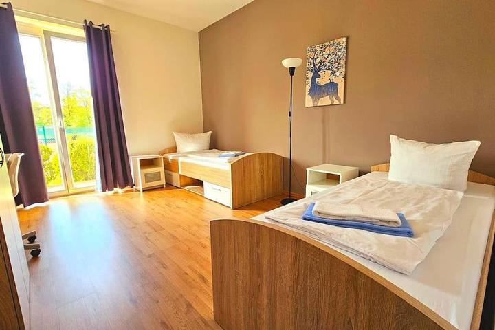 Ferienwohnung für 2 Personen, mit Terrasse und Garten sowie Sauna in Oberschleißheim