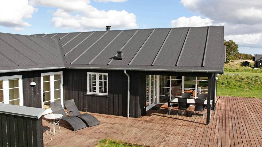 Ferienhaus für 8 Personen, mit Sauna und Whirlpool sowie Balkon/Terrasse und Terrasse in Nysted