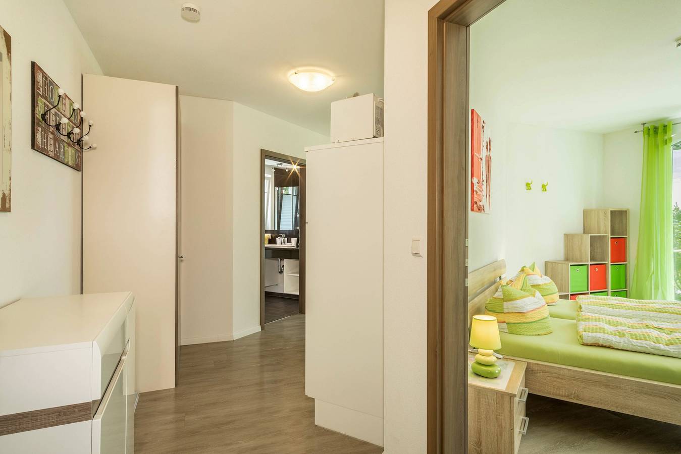 Vakantiewoning 'Orchidee' met groot terras en uitzicht op de bloementuin, foto 9
