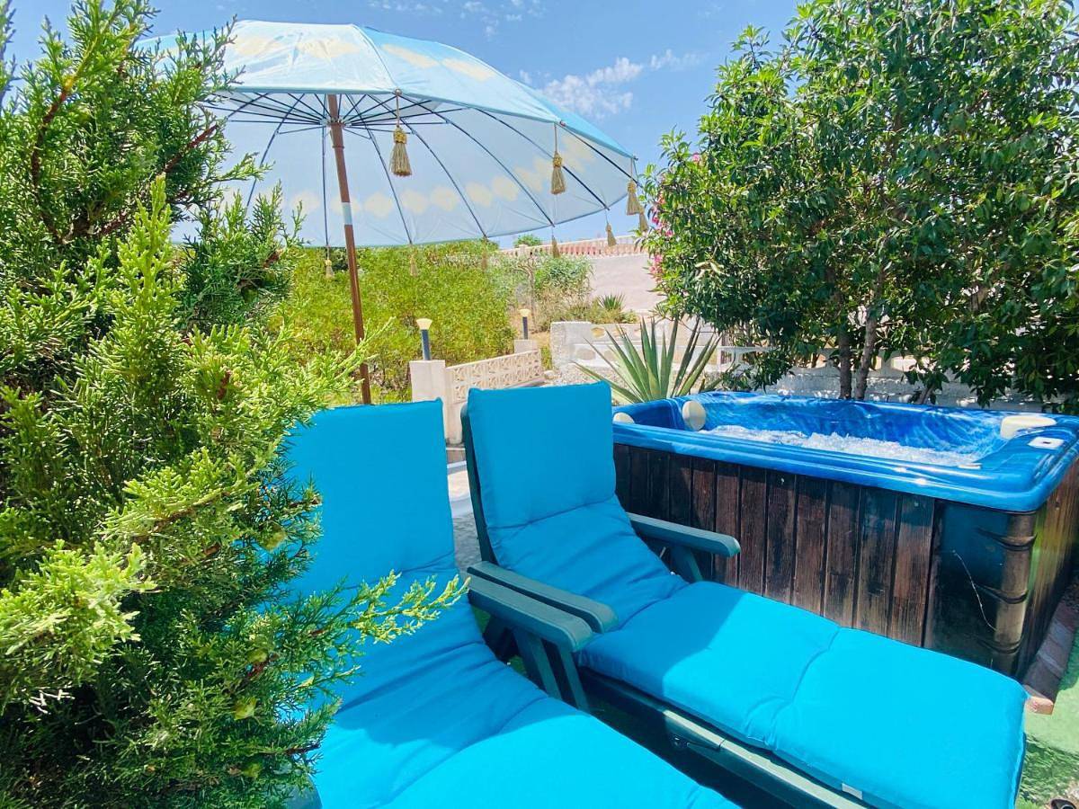 Villa by the sea with jacuzzi, garden & park view in Torrevieja, Costa Blanca