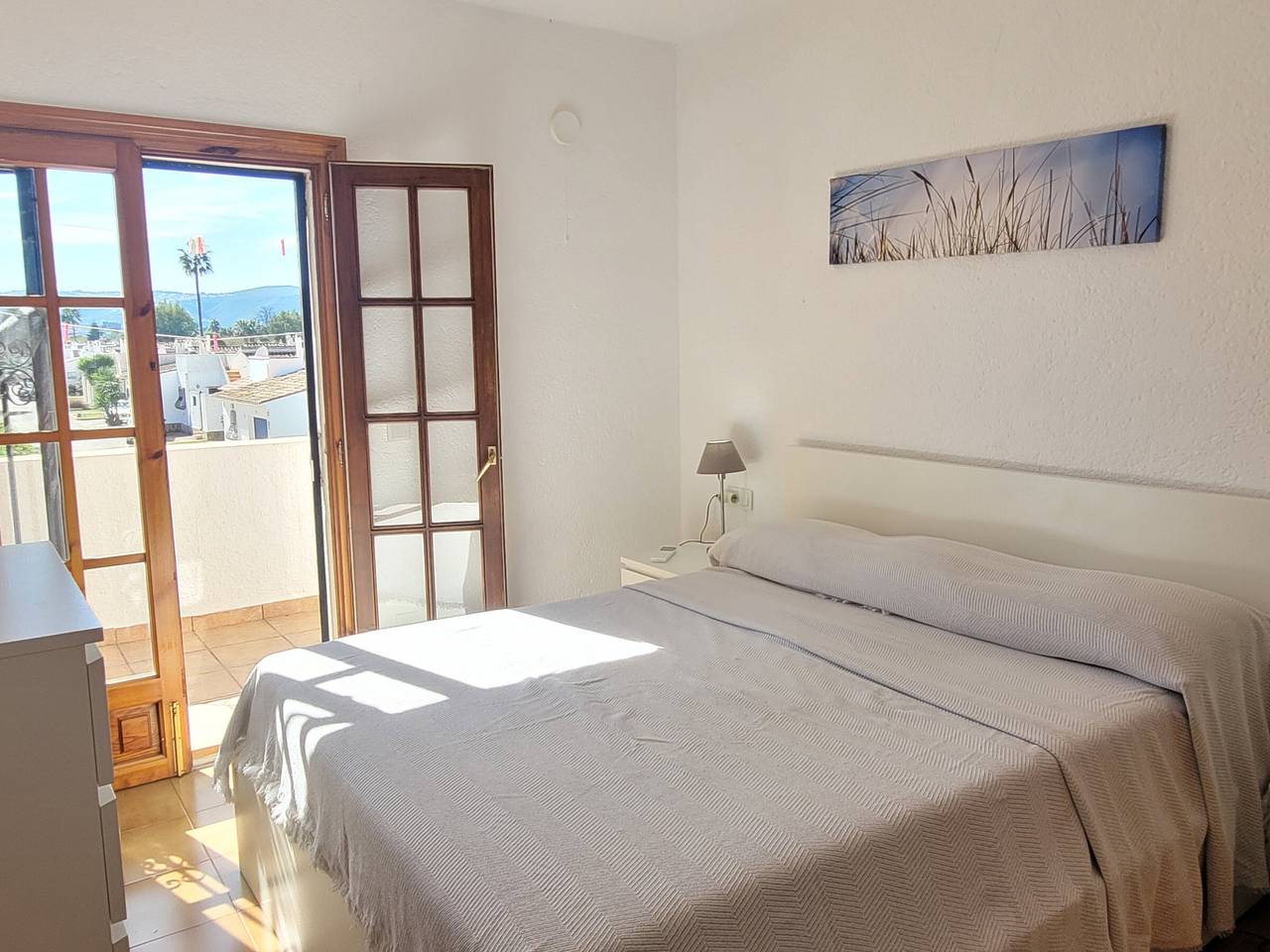 Casa adosada cómoda en Denia con aire acondicionado in Las Marinas, Dénia