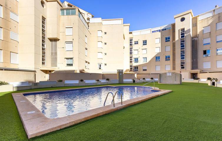 Entire holiday apartment, Sea View Apartment with Pool, Terrace & Parking 200m from Playa de Mutxavista in Platja de l'Horta-Mutxavista (San Juan Playa), San Juan Playa