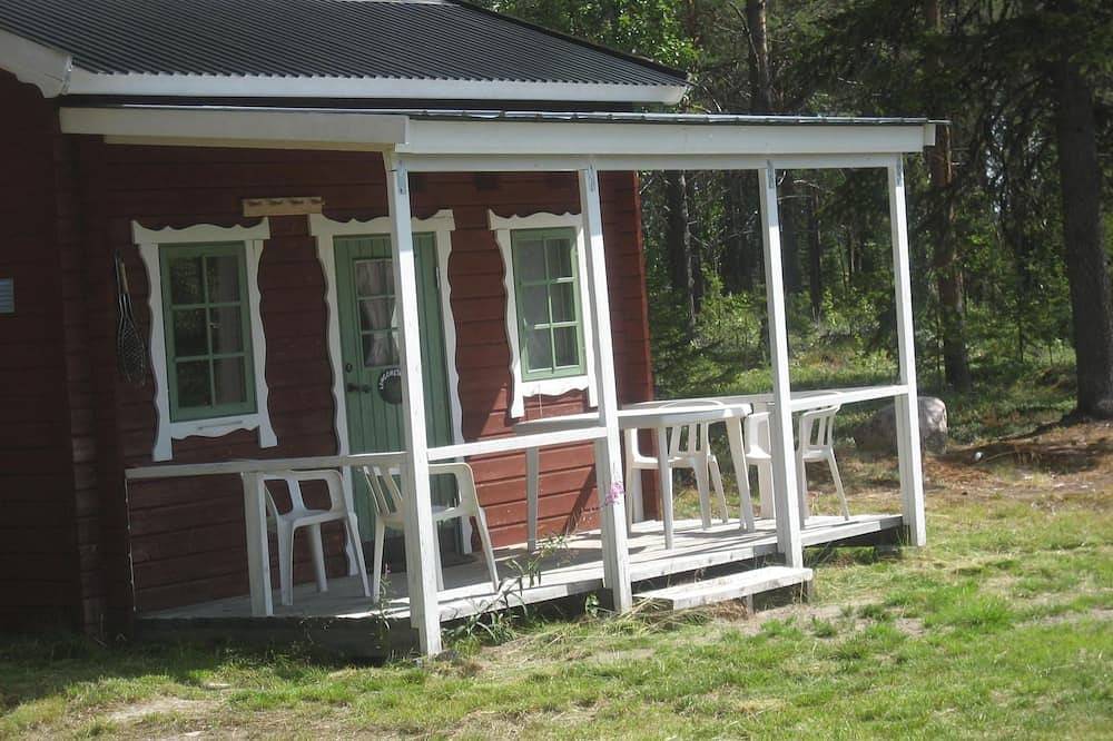 Schwedisches Holzhaus mit Grill und Terrasse in Lappland (Schweden)
