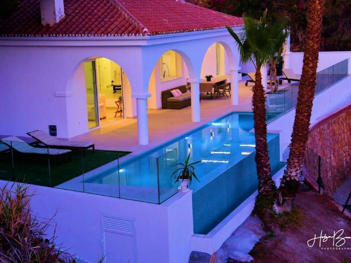 Ferienhaus für 6 Personen, mit Terrasse und Garten sowie Seeblick in Torre de Benagalbón