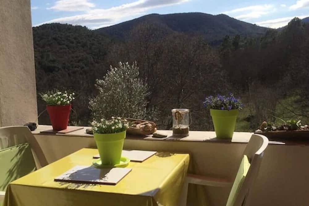 Appartement entier, Domaine du Figuier \" La Cigale\" in former winery, cozy. Apartment for 2 per in Molières-sur-Cèze, Parc national des Cévennes