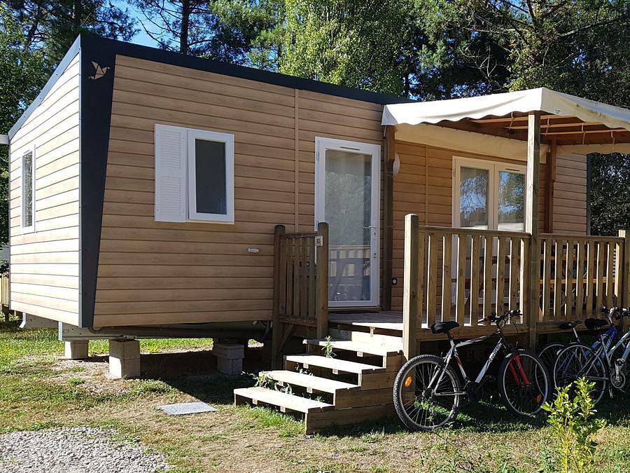 Camping Le Saint Laurent - Mobilhome 4 personas - Mobil-home confort - 29m² - 2 habitaciones - terraza semi-cubierta in Golf Saint-Laurent, Ploemel