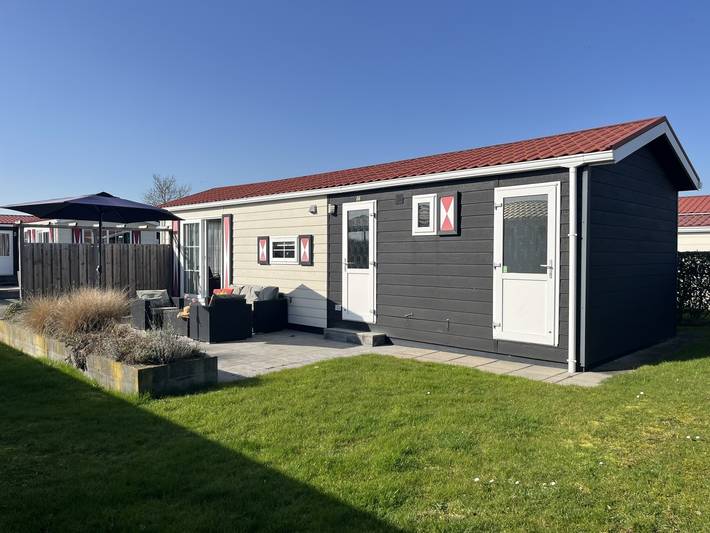 Chalet für 4 Personen, mit Terrasse und Garten, mit Haustier in Serooskerke