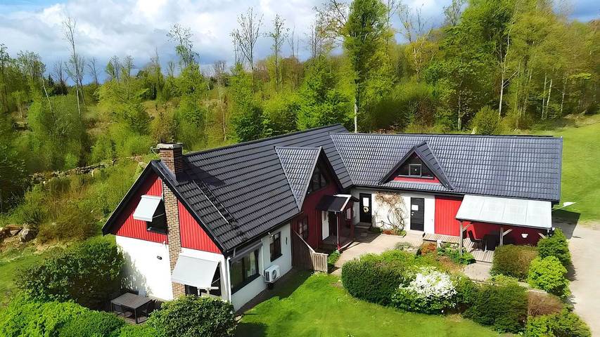 Ferienhaus für 12 Personen, mit Terrasse und Garten sowie Sauna und Ausblick in Osby