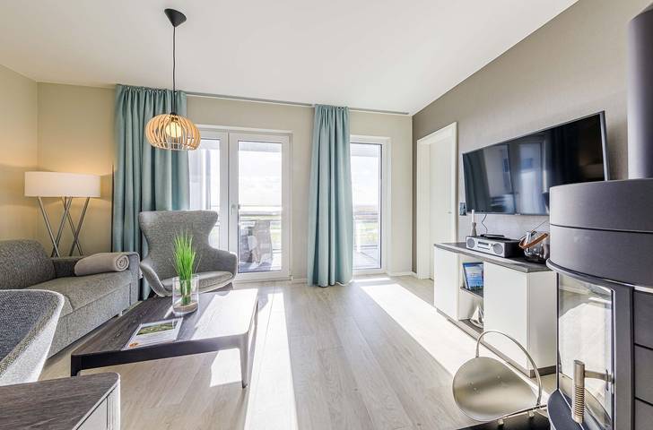 Ferienwohnung für 4 Personen, mit Balkon und Sauna sowie Seeblick, mit Haustier in Wustrow