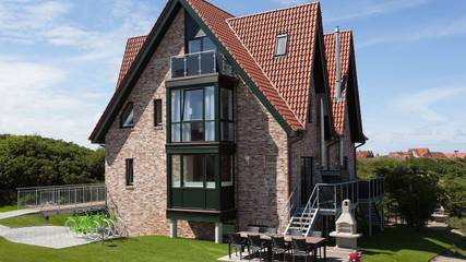 Ferienhaus mit Meerblick für 9 Personen, mit Ausblick und Garten, mit Haustier auf den Ostfriesische Inseln