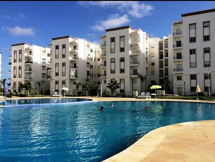Appartement de vacances pour 4 personnes, avec jardin et piscine ainsi que vue et terrasse