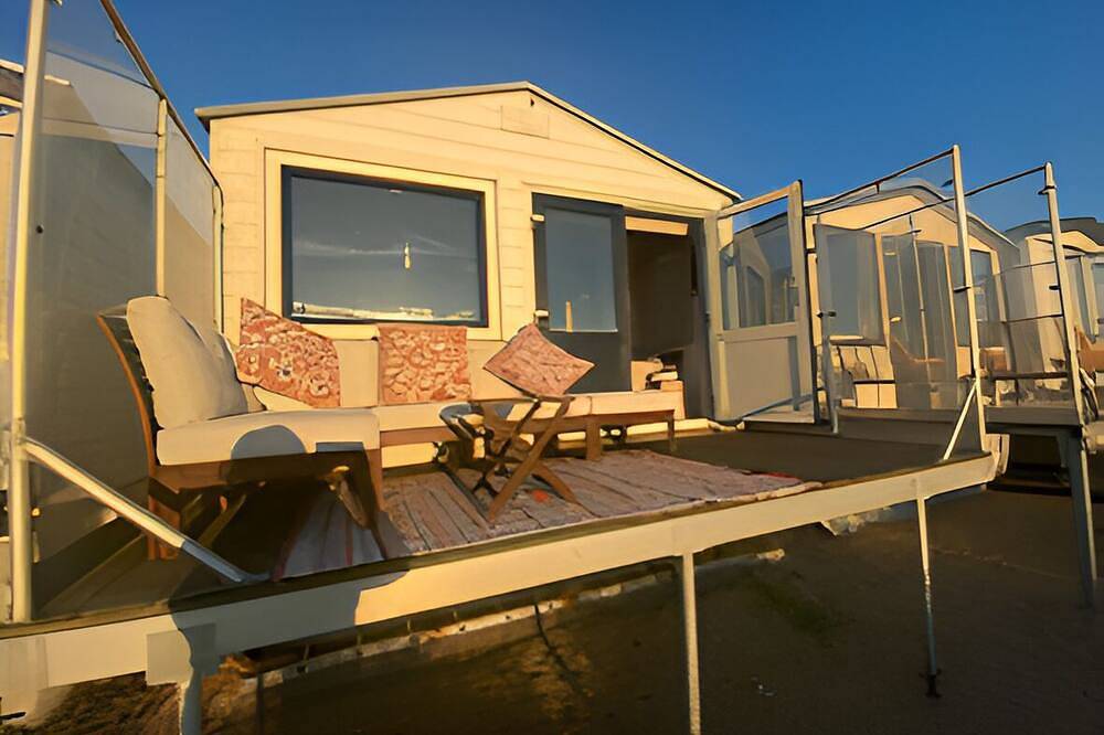 Strandhuisje aan de Noordzee kust - Ijmuiden Kleine Strand in IJmuiden, Nederlandse Noordzeekust