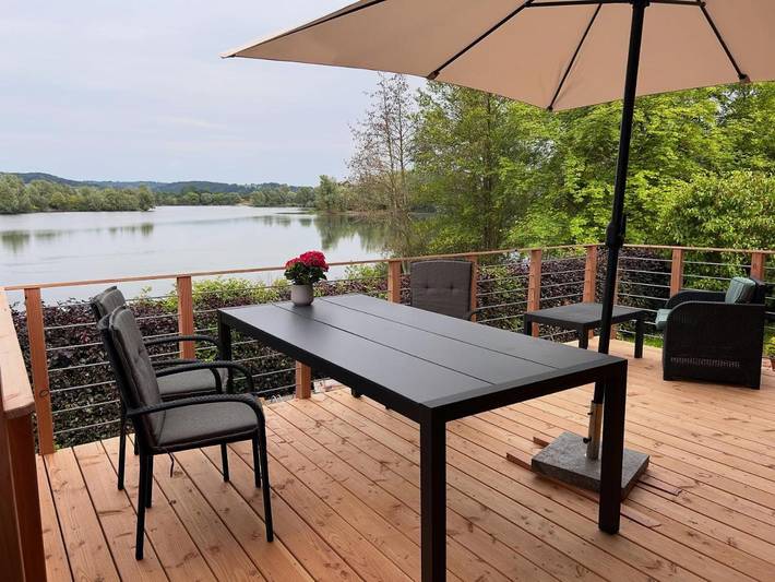Ferienhaus für 3 Personen, mit Terrasse und Garten sowie Ausblick und Seeblick in Lauenförde