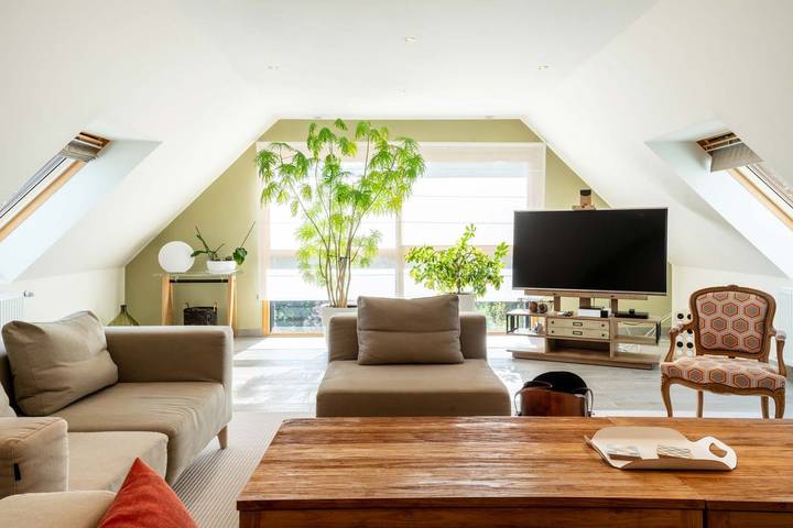 Appartement de vacances pour 4 personnes, avec terrasse ainsi que vue sur le lac et jardin