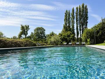 Cottage pour 2 personnes, avec jardin ainsi que sauna et piscine à Genneville