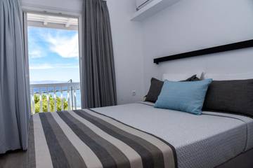 Maison d’hôte pour 2 personnes, avec vue et balcon dans Tinos